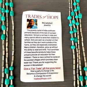 Trades of Hope necklace and Silver Strike earrings